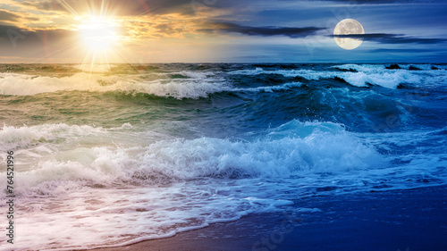 seascape at summer solstice. sea waves crashing beneath a sky with sun and moon. day and night time change concept