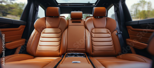 Luxurious front view of brown leather back passenger seats in modern stylish luxury car photo