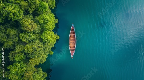 a scene of floting boat on a very peaceful lake , coloful image, sirreal, top view, boat has pointy edge shape, minimalist photo photo