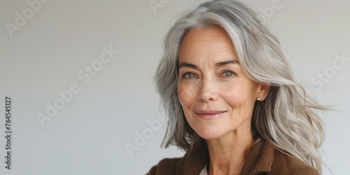 beautiful smiling elderly woman with gray hair on white background, lady, grandmother, old age, wrinkles, person, portrait, face, wrinkles, studio photo, skin care photo