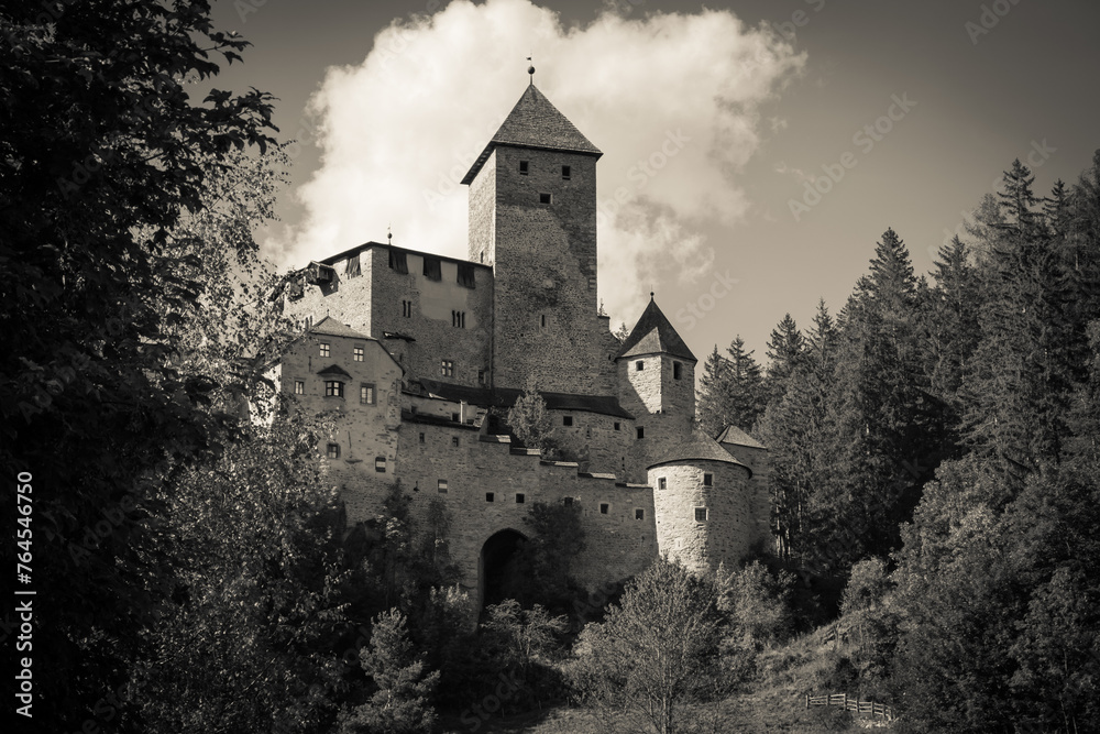 Black and white view of medieval castle in Campo Tures, Valle Aurina, Italy