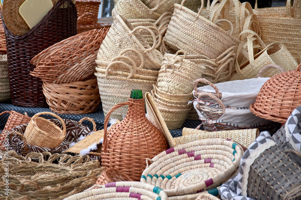 Traditional bamboo and wicker baskets at the Barcelos market in Portugal