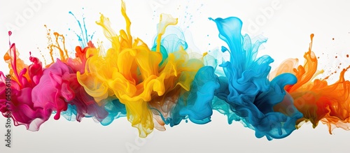Vibrant and diverse splashes of colorful paint spread out artistically on a clean white background