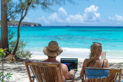 Couple's Tranquil Beach Office: Embracing Remote Work & Vacation Vibes with Laptops on Tropical Beach, Showcasing Serenity, Connectivity, and Luxury in Exotic Location - A Digital Nomad's Dream.