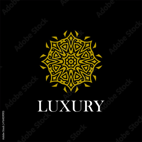 luxury ornamental mandala design background in gold color