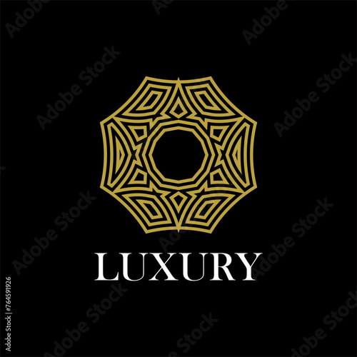 luxury ornamental mandala design background in gold color