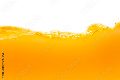 Close up bright orange juice texture for health and nature waves © watchara