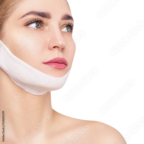 Young woman uses chin mask for chin lifting.