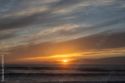 Espinho beach in Portugal  with a blue and orange sky. With sunset.