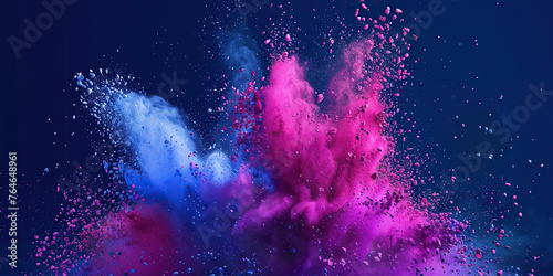 A dynamic burst of blue and pink colored powder fills the frame, creating a vivid and abstract display of colors and movement.