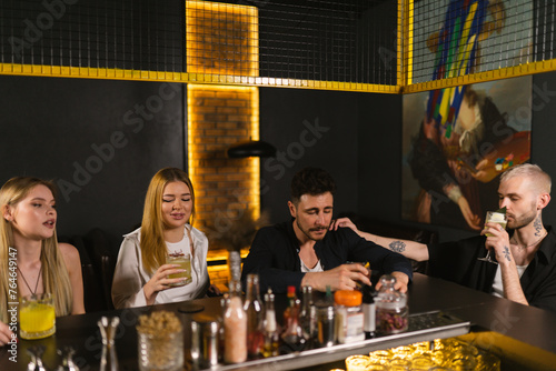 Фотография Pals convene to sip on colorful cocktails during weekend