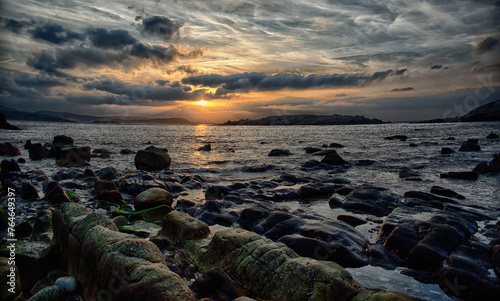 Seashore at low tide at sunset