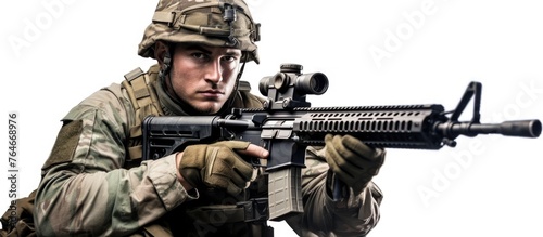 A military soldier in camouflage uniform aiming a rifle with forest trees in the background