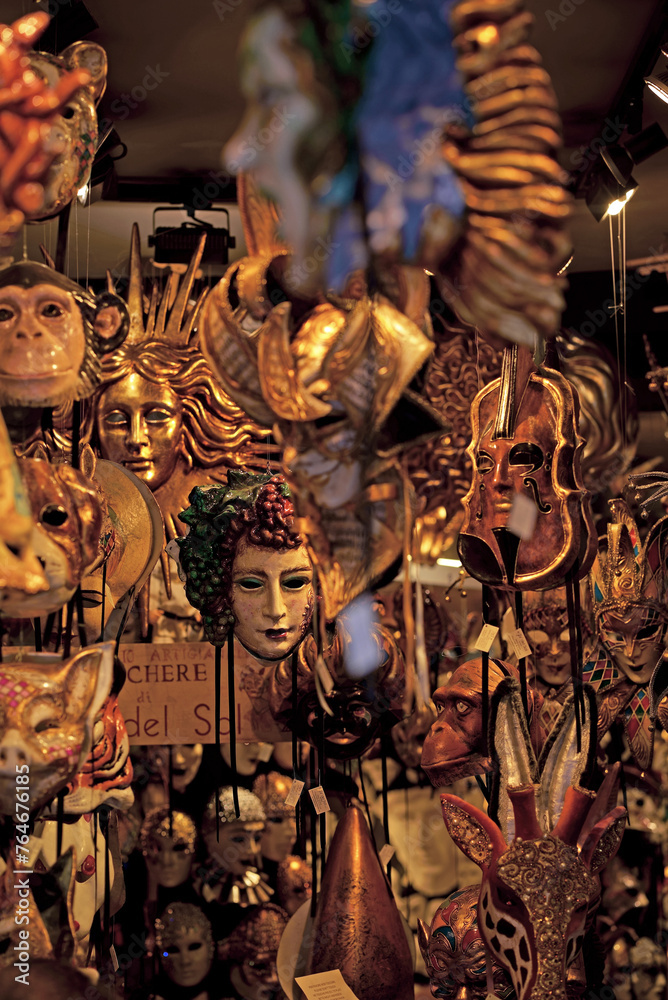 masks in a store in Venice. Venetian masks in store display in Venice. Annual carnival in Venice is among the most famous in Europe. Its symbol is the Venetian mask