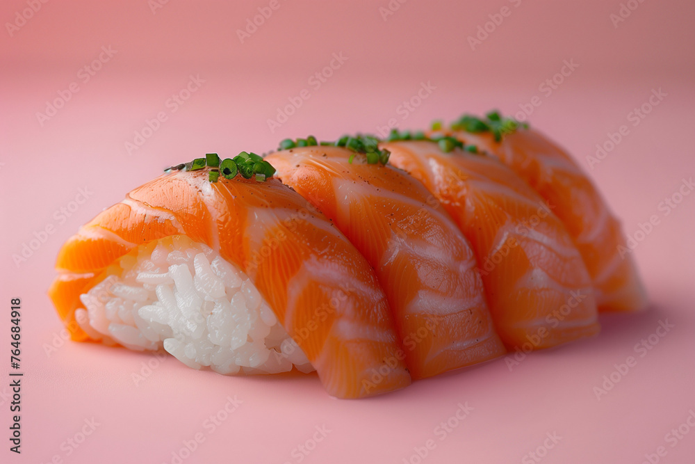 Set from four close up of salmon sushi set with microgreen on top on pink background Set from four close up of salmon sushi set with microgreen on top on pink background