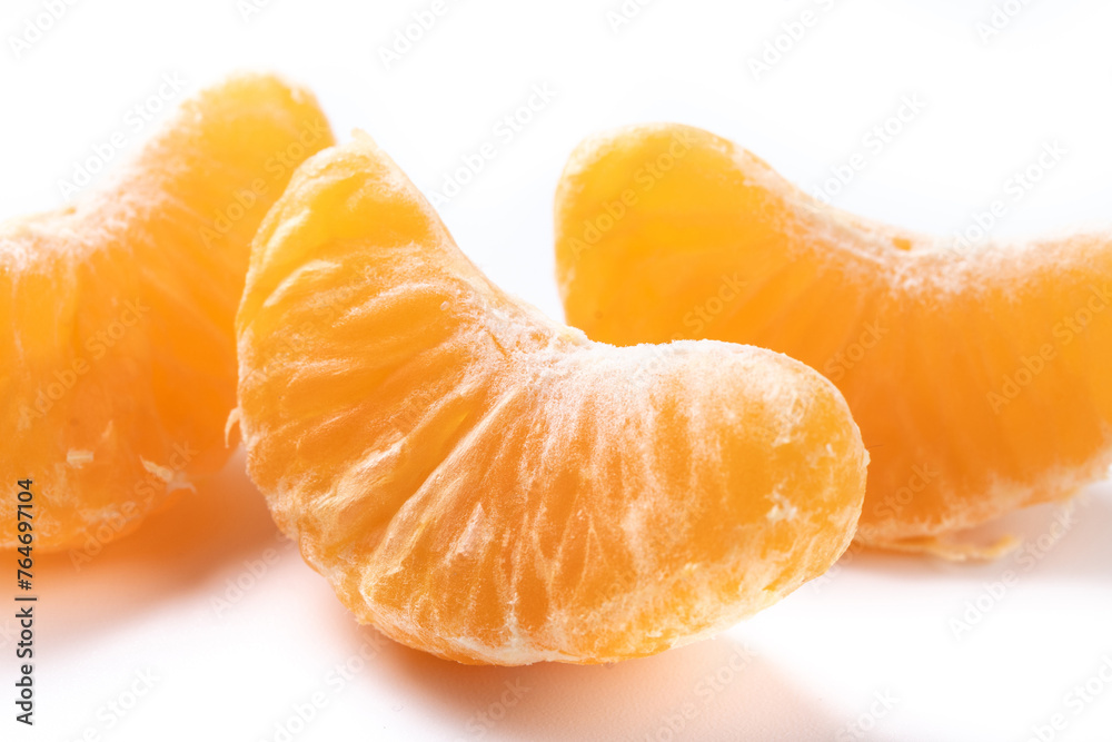 Fresh tangerines slices isolated on white background Fresh tangerines slices isolated on white background