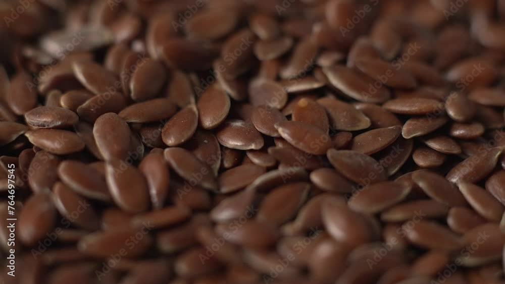 Bunch of flax seeds rotating. Macro video of flax seeds. Bunch of flax seeds rotating. Macro video of flax seeds.