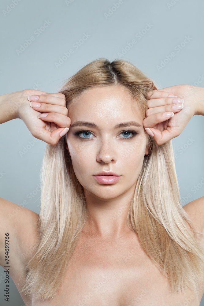 Fototapeta premium Gorgeous blonde model woman portrait. Facial treatment, cosmetology, skin care concept