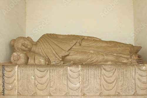 Sleeping Buddha statue at Dhauli Shanti Stupa, Dhauligiri ,Odisha, India photo