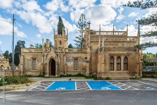 Paola, Malta - January 28th 2022: The Gatehouse at the entrance of the Santa Maria Addolorata Cemetery also known as the Addolorata Cemetery.  photo