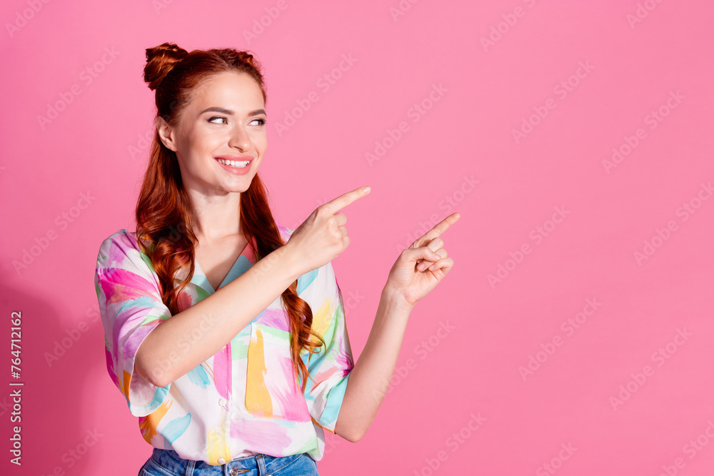 Photo of cheerful girl with redhair tails dressed colorful blouse look directing at sale empty space isolated on pink color background Photo of cheerful girl with redhair tails dressed colorful blouse look directing at sale empty space isolated on pink color background