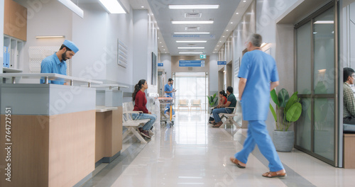 Establishing Shot of Active Local Indian Health Clinic Lobby, Representing Modern and Advanced Healthcare Services with Nurses and Doctors. Diverse Patients Waiting in Reception Hall in a Hospital