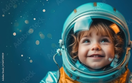 A little kid in an astronaut costume