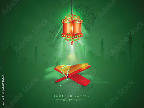 Islamic religious book Quran Shareef with rosary shining in the lantern's light on Mosque silhouette background for Islamic holy month of prayers, Ramadan Kareem celebration.