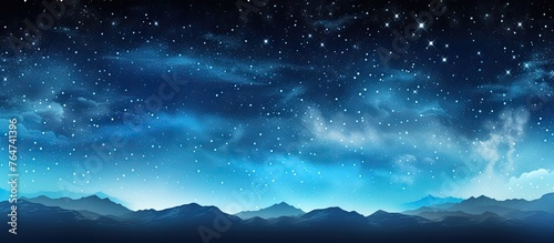 An image depicting a dark sky filled with stars above towering mountains in the background