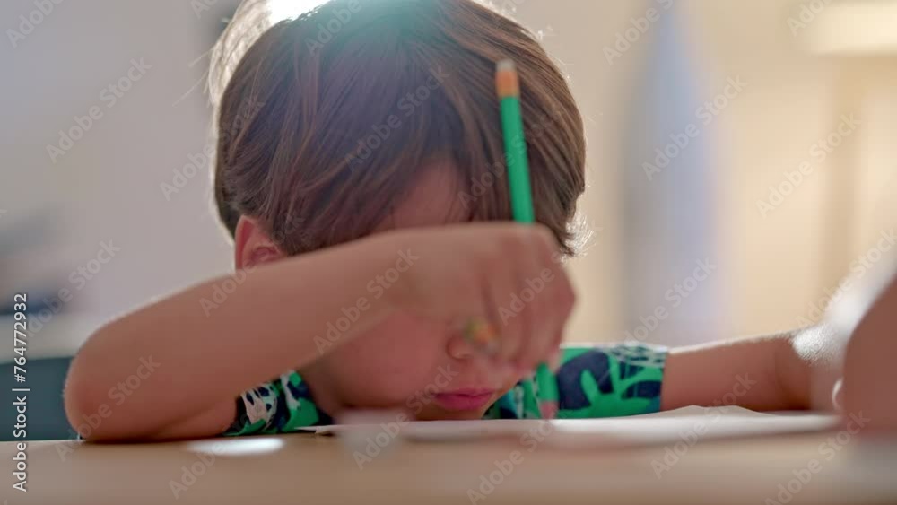 Little Boy Using Pencil With Eraser Tip And Kid’s Bandage On Finger - Doing Homework With Mom’s Help Little Boy Using Pencil With Eraser Tip And Kid’s Bandage On Finger - Doing Homework With Mom’s Help