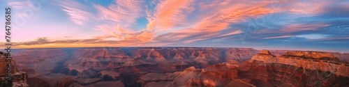 panoramic view of tranquil canyon cliffs under a stunning dusk sky
