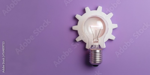 Light bulb and gear on purple background with copy space, ideas and creativity concept