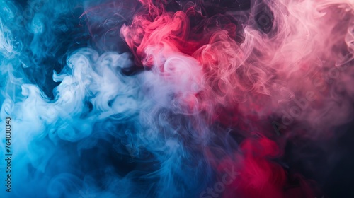 An abstract background featuring color smoke in cold and hot tones, illustrating the contrast between blue and red with a defocused effect