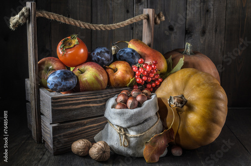 pumpkin and ingredients on a dark wooden background in a rustic style