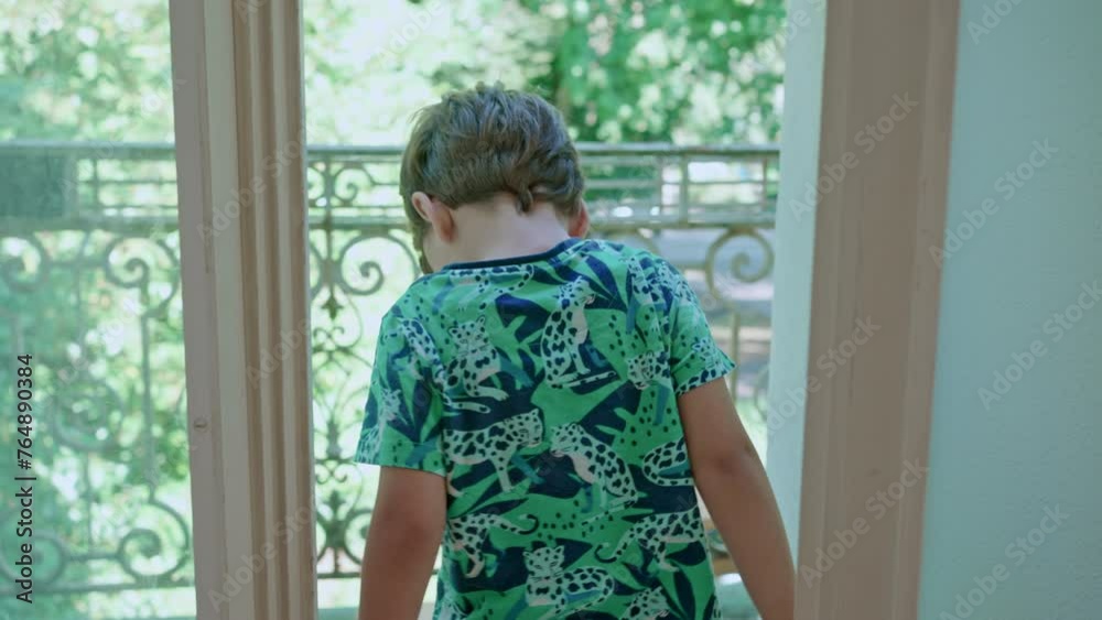 Child Stepping Outside At Home To Enjoy The View. Little Boy Exploring Neighborhood With Eyes Child Stepping Outside At Home To Enjoy The View. Little Boy Exploring Neighborhood With Eyes