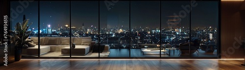 Expansive window to a serene urban nightscape in a sleek