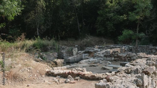 Ruins of Great Basilica in Butrint National Park, Buthrotum, Albania. Triconch Palace at Butrint Life and death of an ancient Roman house Historical medieval Venetian Tower surrounded. Butrint photo