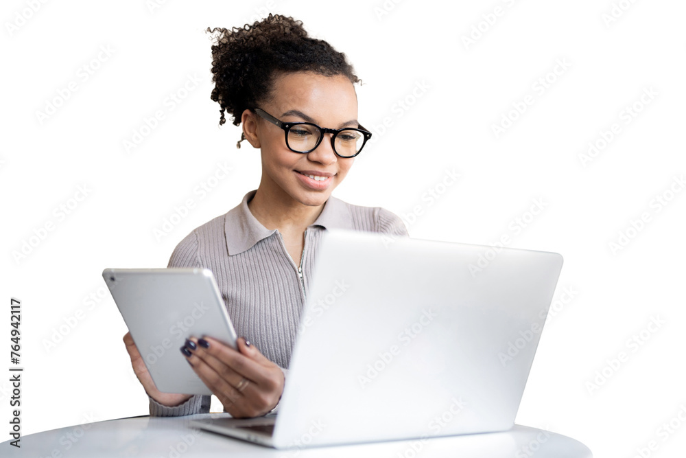 The woman is smiling, working in the office, using a laptop and tablet, transparent isolated background. The woman is smiling, working in the office, using a laptop and tablet, transparent isolated background.