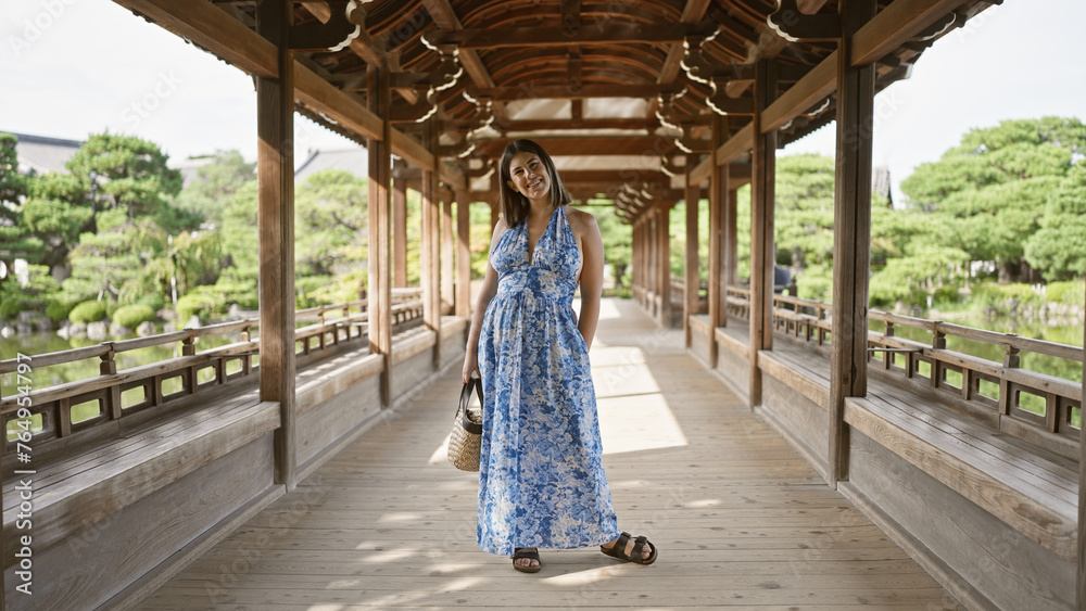 Beautiful hispanic woman, a radiant portrait of happiness and confidence, smiling and posing joyfully at traditional heian jingu in kyoto, japan, portraying carefree fun and success Beautiful hispanic woman, a radiant portrait of happiness and confidence, smiling and posing joyfully at traditional heian jingu in kyoto, japan, portraying carefree fun and success