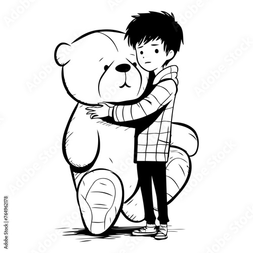 Cute boy hugging a big teddy bear.