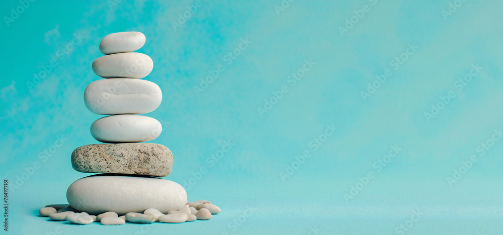 Zen Stones Balance Concept with Turquoise Background Zen Stones Balance Concept with Turquoise Background