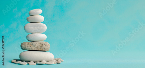 Zen Stones Balance Concept with Turquoise Background