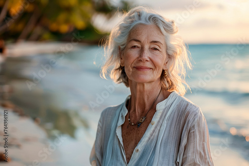 Mature woman on a tropical island, enjoying the palm-fringed beach, seaside relaxation.