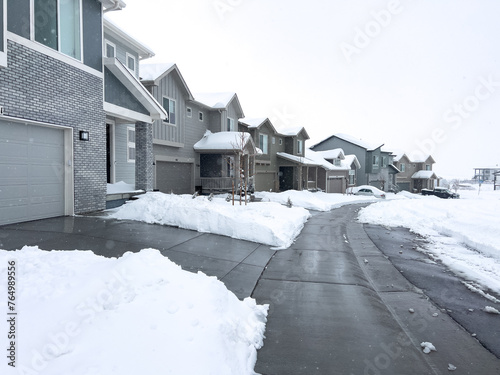 Freshly Shoveled Driveways After Winter Snowfall © arinahabich