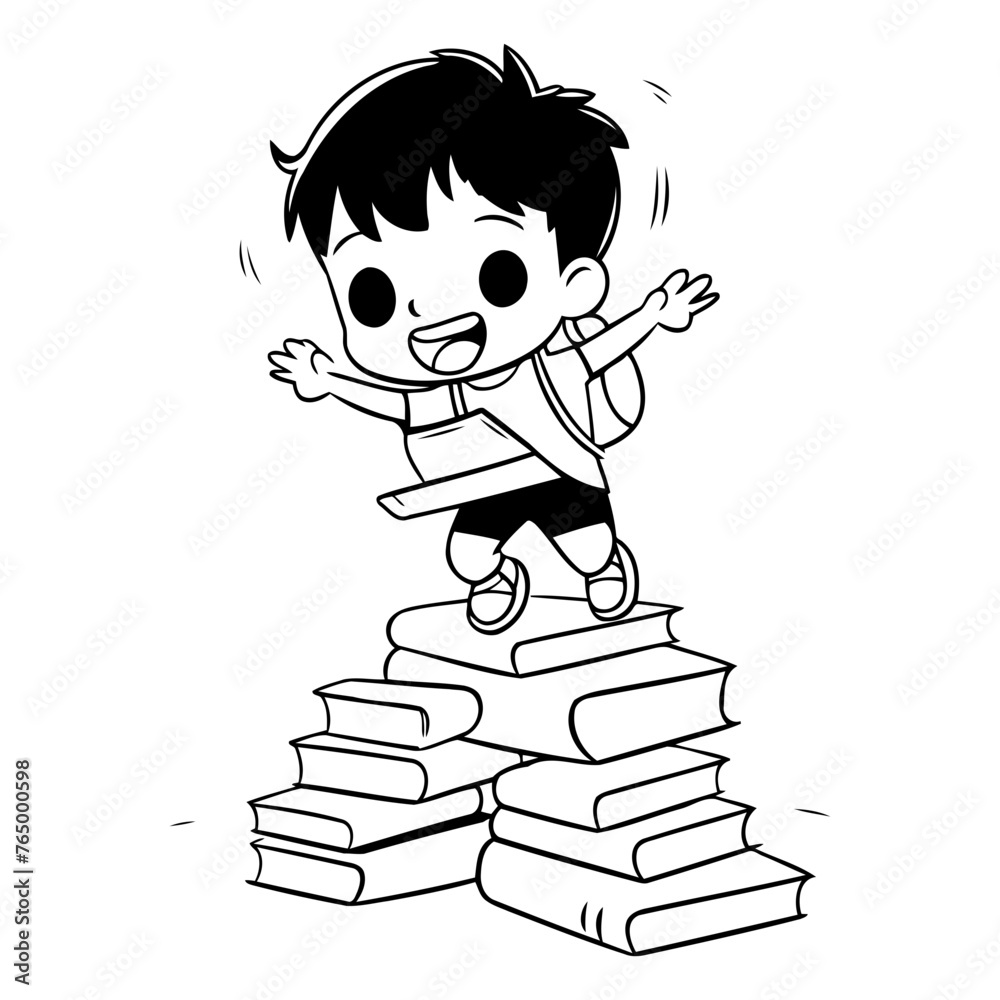 Cute boy jumping on a pile of books.