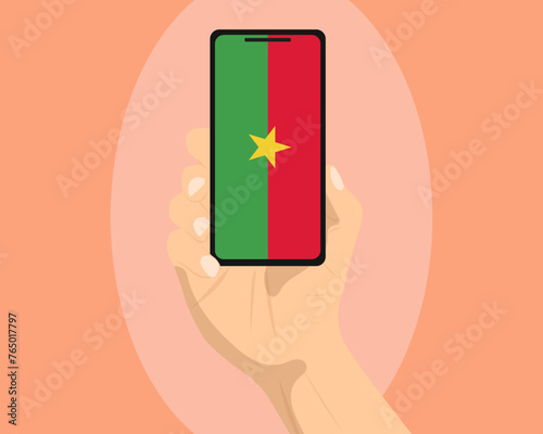 Burkina Faso flag on mobile phone screen, holding smartphone, advertising social media or banner concept