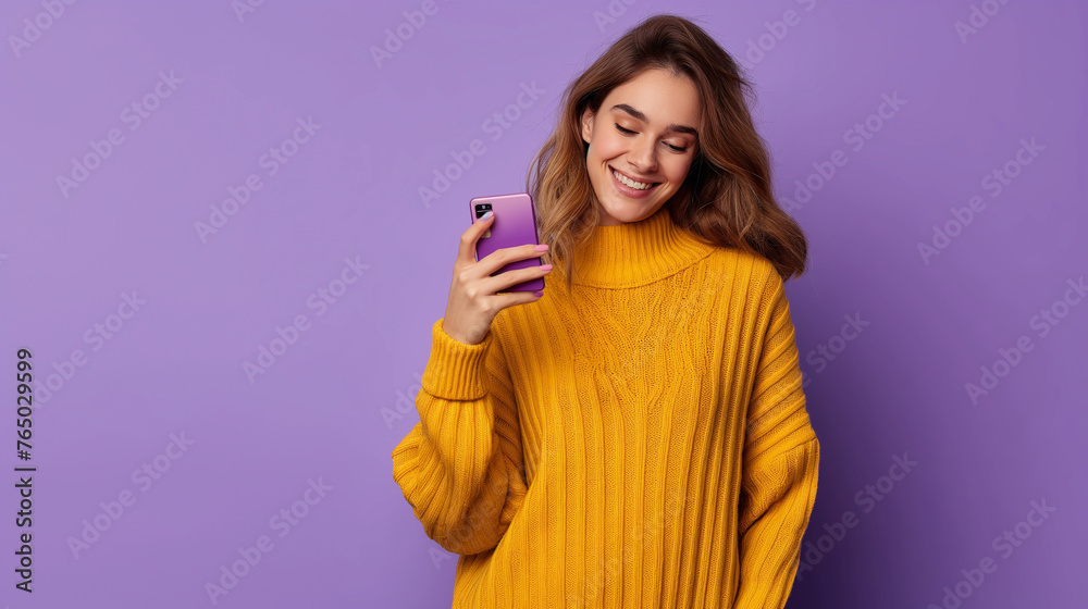 full length Woman with credit card using smartphone for online shopping on purple color background professional photography. full length Woman with credit card using smartphone for online shopping on purple color background professional photography.