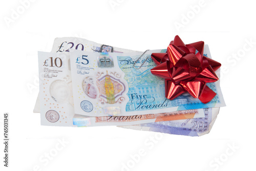 Cut out - Money with a ribbon rosette - concept - financial gifts / holiday money. UK Pounds. photo