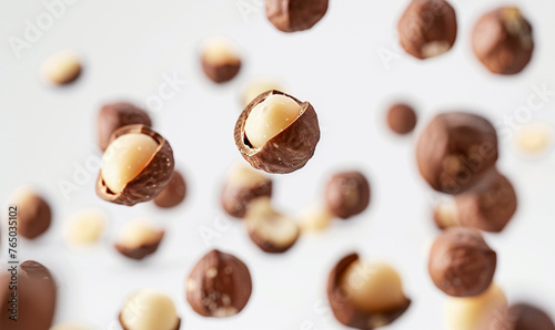 macadamia floating in the air on the white background.