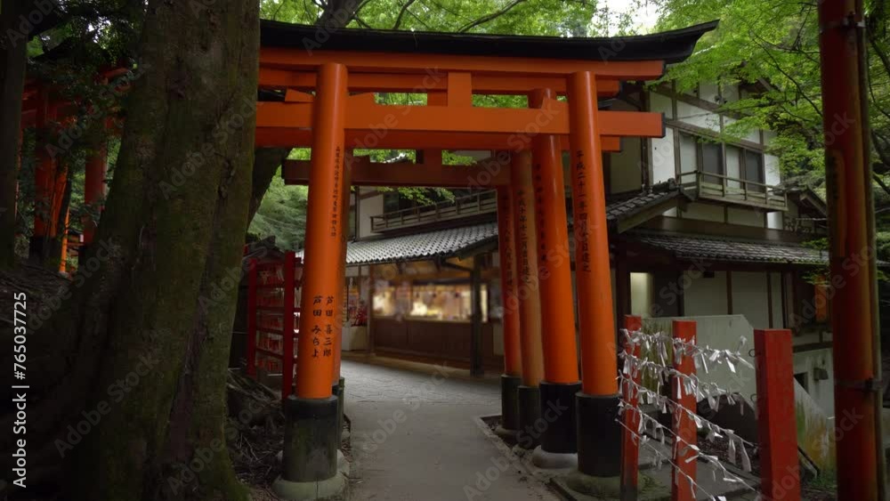 Ancient Japanese Temple - Red Torii Gates and Store in Old Building in Forest of Kyoto Ancient Japanese Temple - Red Torii Gates and Store in Old Building in Forest of Kyoto